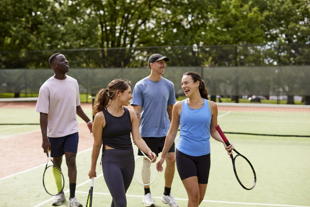 How Court Surfaces Shape the Game of Tennis - Evolve Tennis Academy